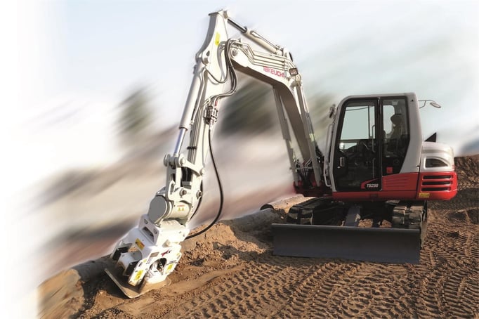 Bild: Takeuchi Bagger TB 290 mit angebautem Anbauverdichter