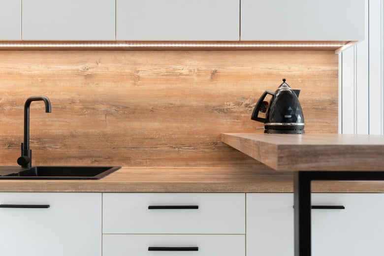 Kettle placed on wooden counter of minimalist in the kitchen butler pantry