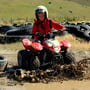Zwar kein Monstertruck, aber dennoch spassig, mit dem Quad-Bike durch den Schlamm zu fahren.