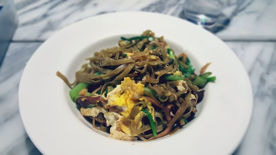 Stir fried noodles with oyster mushrooms, bak choy, beansprouts, spring onions, eggs and chilli paste at Real Food Cafe Orchard Central