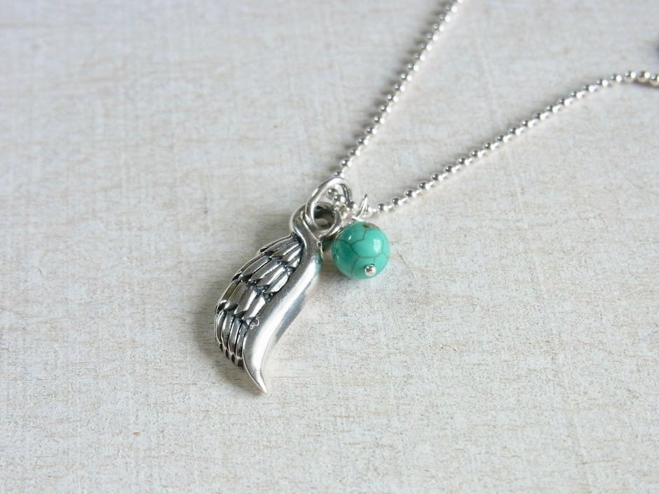 Filigrane Kette mit Flügel Anhänger aus Silber und Türkis Perle