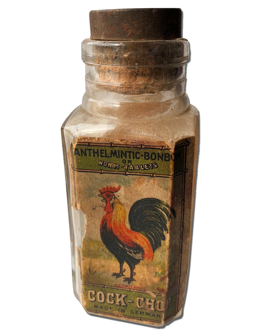 A bottle of COCK-CHOP worm tables. From the MOFBA collection.
