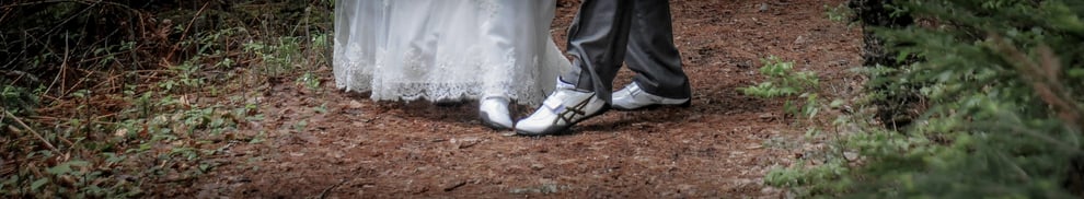 Coach Jenn and Coach Jake love throwing so much that they were married in throwing shoes